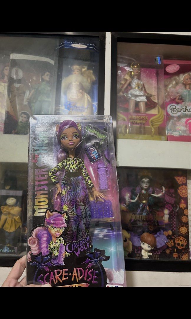 Monster High Scare-Adise Clawdeen Wolf Doll (Category: Kids Toys) located in Marikina City. Submitted by joaquin222018 (Listing ID 1466067906, Image 1). Description: Nakaangat na ang plastoc c9ver dented box old stock - Item: Monster High Scare-Adise Clawdeen Wolf doll - Condition: Brand new, still sealed in original packaging - Includes: Signature purple hair, animal print top, patterned pants, sunglasses, purple handbag, and drink accessory - P