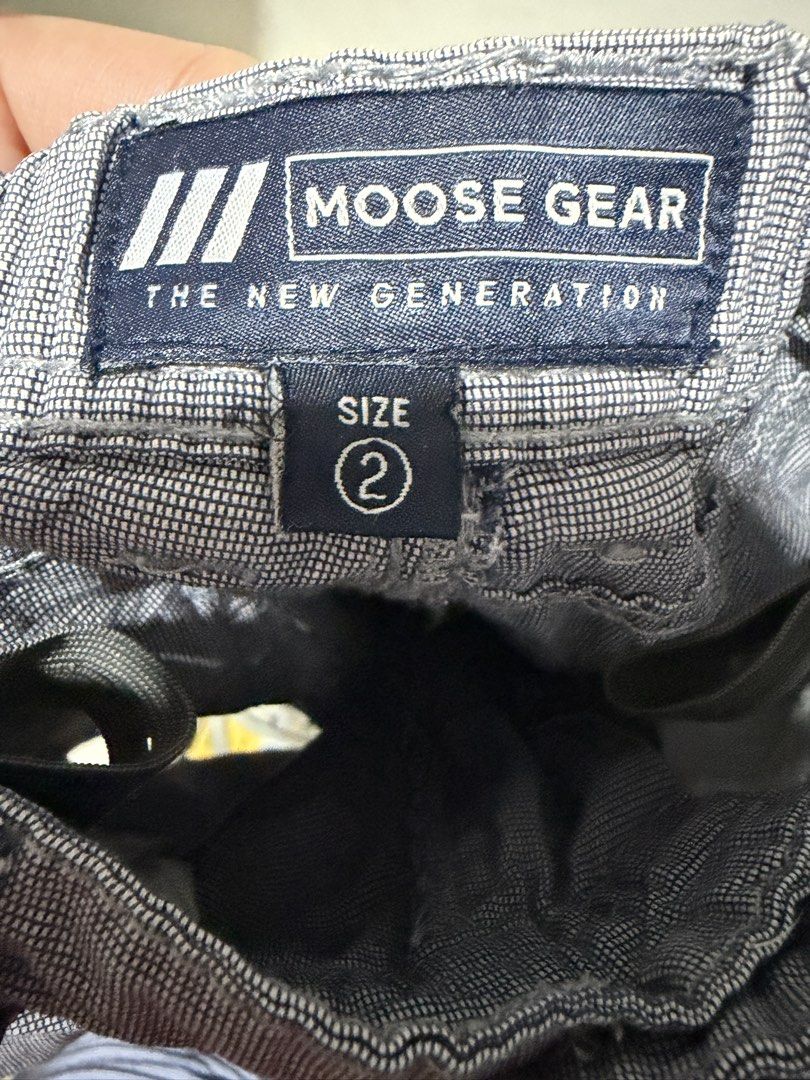 Moose Gear Kids Grey Shorts Size 2 (Category: Shorts) located in Bocaue. Submitted by graceeshoppe (Listing ID 1466142621, Image 2). Description: - Brand: Moose Gear - Size: 2 (toddlers) - Color: Grey - Waist: Elastic waistband with front button and belt loops - Pockets: Two functional front pockets - Details: Signature embroidered Moose Gear logo patch near the bottom hem.