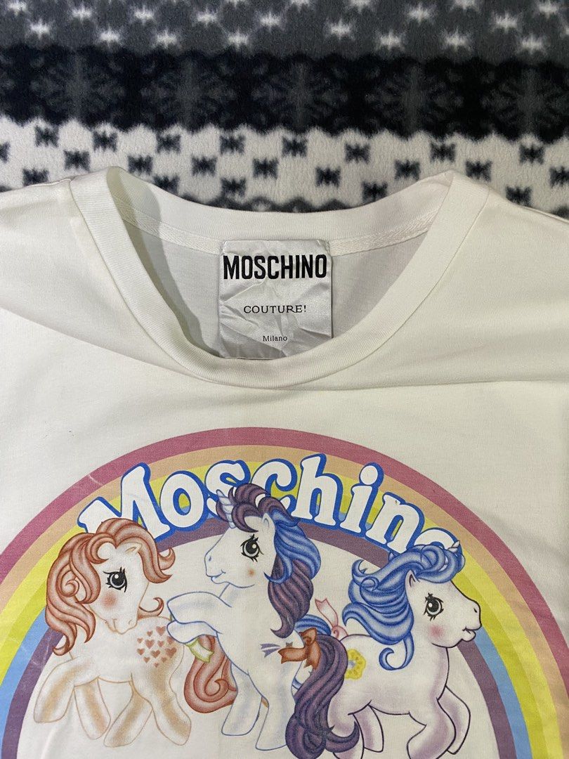 Moschino (Category: Shirts) located in General Santos City (Dadiangas). Submitted by nokkie_thrift (Listing ID 1466141108, Image 3). Description: Moschino Good condition Dimes 18x24.