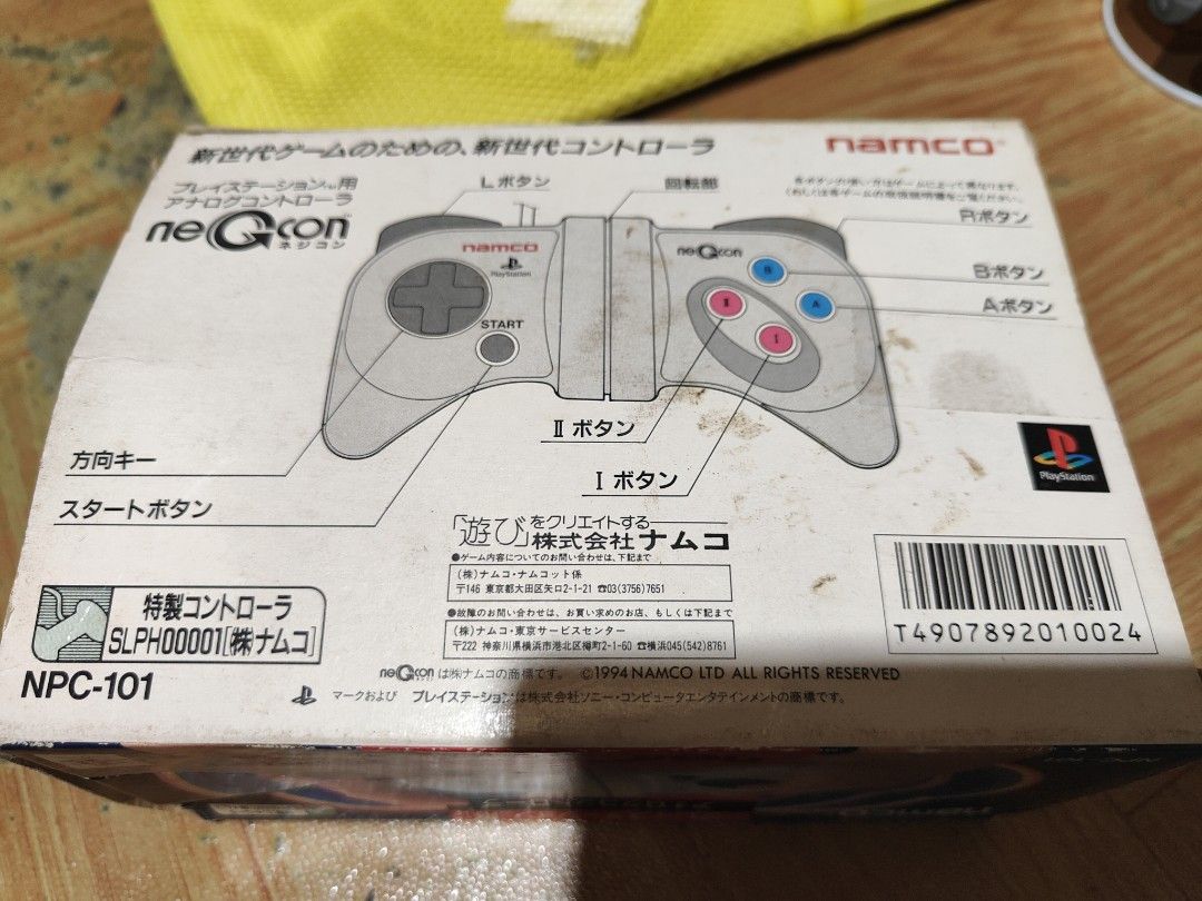 Namco neGcon PlayStation Controller NPC-101 with Box (Category: Controllers) located in Manila. Submitted by wuxue998 (Listing ID 1466054916, Image 3). Description: - Platform: Original PlayStation (PS1) - Model: NPC-101 (Made in Korea) - Design: Unique twisting body with D-pad, start button, and I, II, A, and B buttons - Condition: Controller in great working order; original box included with minor shelf wear and tear - Inclusions: Controller wi