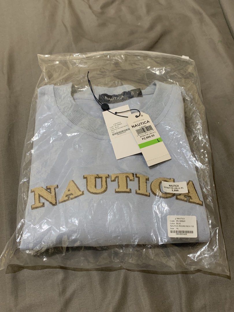 Nautica Shirt (Category: Tshirts & Polo Shirts ) located in Manila. Submitted by teyshon6767 (Listing ID 1466082957, Image 1). Description: - Nautica shirt light blue - width 23 -length 29 -SRP 2,999) Bought it 30% off 2,100 Selling Price: ₱1,700 RFS: binili lang dahil sale, Sinukat lang then hindi na nagamit 📍Mandaluyong City.
