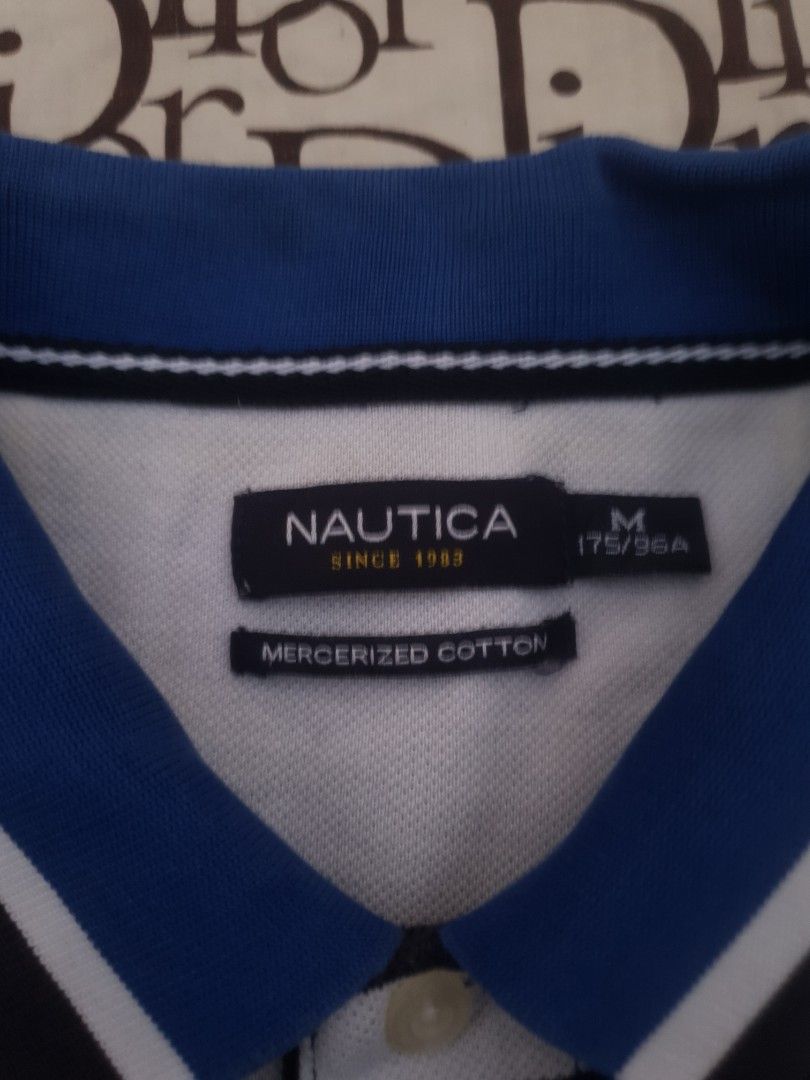 Nautica stripe poloshirt (Category: Tshirts & Polo Shirts ) located in San Fernando. Submitted by retro.district. (Listing ID 1466085632, Image 3). Description: - Nautica stripes blue Poloshirt - Size: XL (24x29) - Condition: Excellent - No issue - Color Rate: 9.5/10.