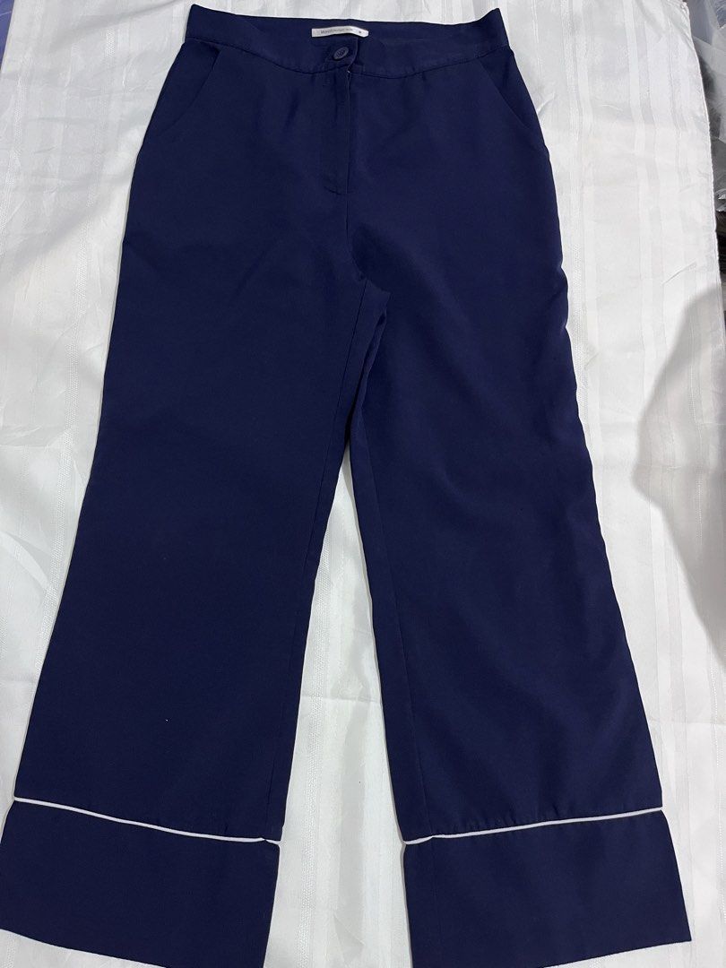 Navy Blue Pants with White Trim Size M (Category: Jeans) located in Baguio. Submitted by gbwardrobe (Listing ID 1466093777, Image 1). Description: - Color: Navy blue with contrasting white trim on bottom hems - Size: M - Fit: Straight-leg - Features: Front button closure and functional side pockets - Style: Clean look, versatile for casual or smart-casual outfits 27-28.
