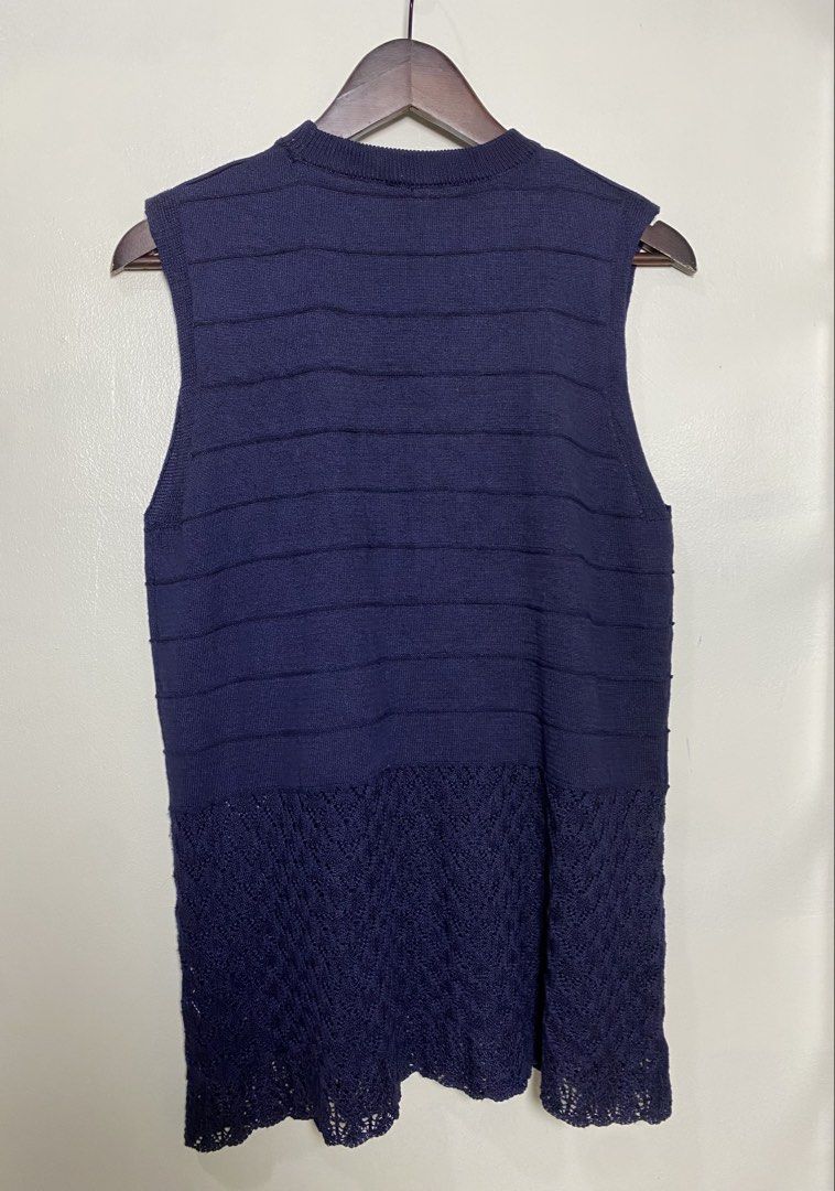 Navy knit sleeveless top (Category: Sleeveless) located in Makati City. Submitted by indaysukaycloset (Listing ID 1466026041, Image 3). Description: as-ideal NAVY KNIT SLEEVELESS TOP Brand: as-ideal Size: L on tag - Fits M-L Color: Navy Blue Details: - Material: Knit / Cotton knit - thick but presko, stretchy - Design: Horizontal ribbed pattern top, crochet / lace flared hem - Neckline: Round / Crew neck - Style: Sleeveless vest top - pang-layeri