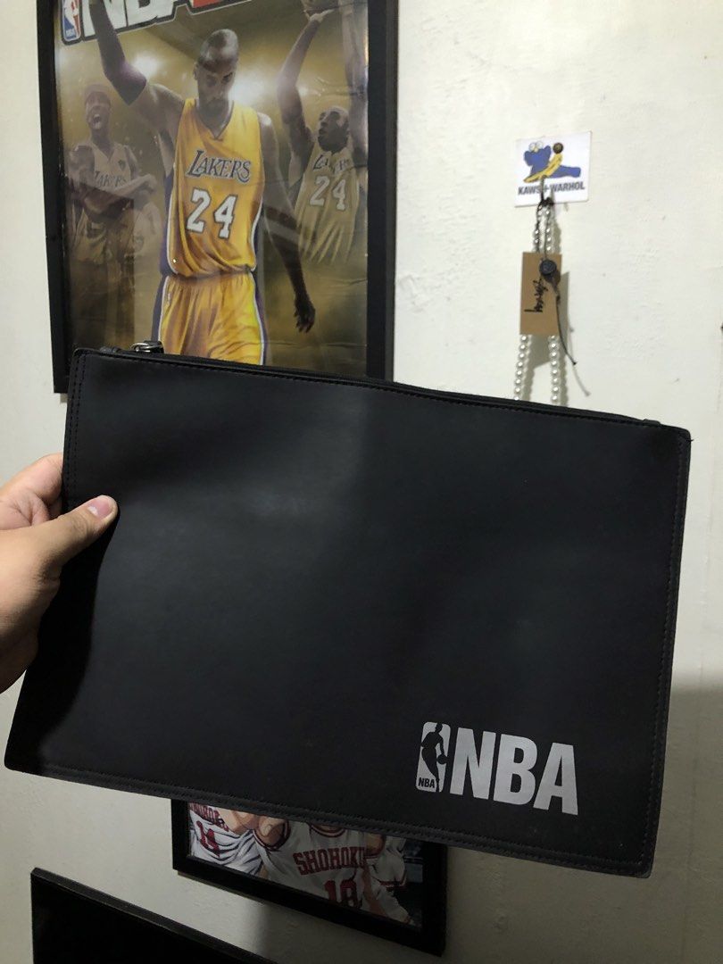 NBA Clutch Bag Logo (Category: Belt bags, Clutches and Pouches) located in Makati City. Submitted by ryota88 (Listing ID 1466137480, Image 2). Description: Official NBA branded document pouch bag Secured top zipper closure A must-have, straightforward accessory for basketball fans.