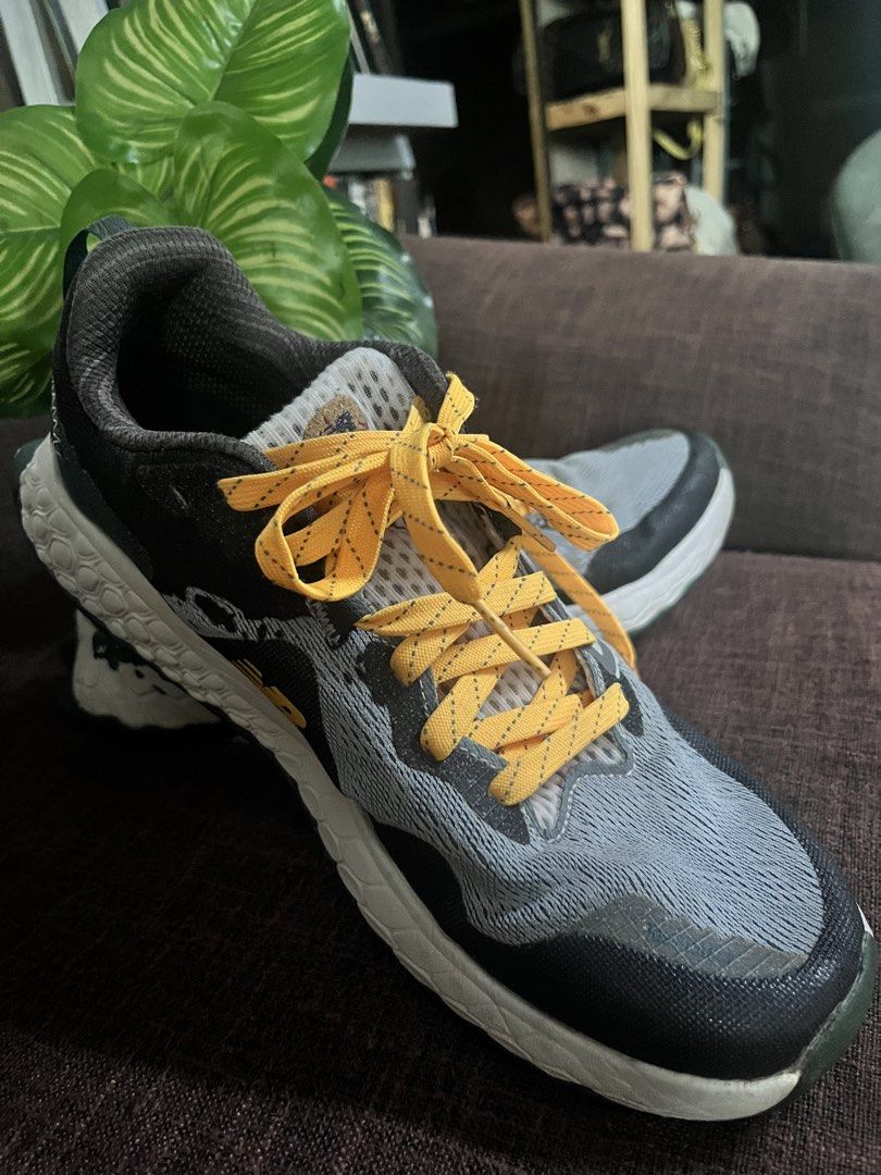 New Balance (Category: Sneakers) located in Quezon City. Submitted by retann (Listing ID 1465956662, Image 1). Description: - Brand: New Balance - Model: Fresh Foam Trail Running Shoes - Color: Grey and black upper with chunky white/dark green midsoles and reflective yellow laces - Outsole: Vibram rubber with deep lugs for maximum traction - Protection: Top Protect toe reinforcement on the front - Branding: Fresh Foam on the heel counter - Condit