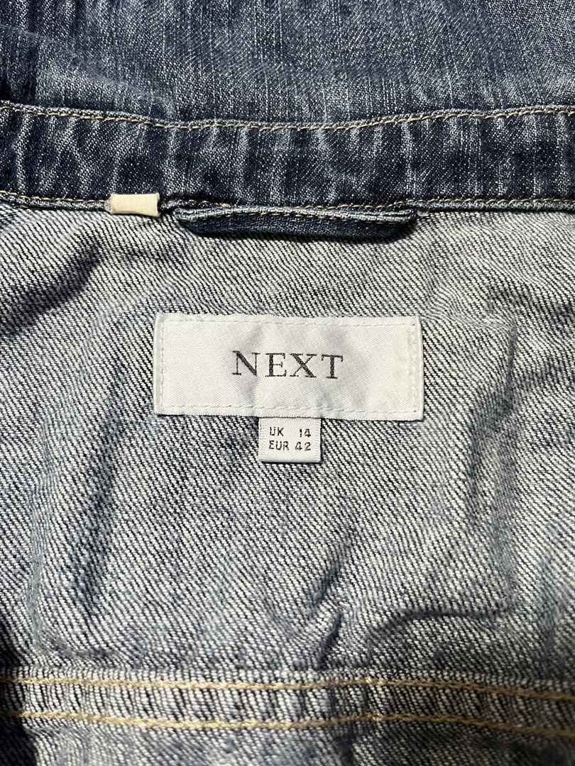 NEXT Denim Jacket (Category: Coats, Jackets and Outerwear) located in Quezon City. Submitted by unoweeko (Listing ID 1466148588, Image 2). Description: Pre-loved NEXT denim jacket. RFS: No longer wearing. No issues. UK: 14, EU: 42 Length: 19” Sleeves: 22.5” Chest: 13” Shoulder: 14” Waist: 17” Has zipper and buttons. Negotiable for SURE buyer..