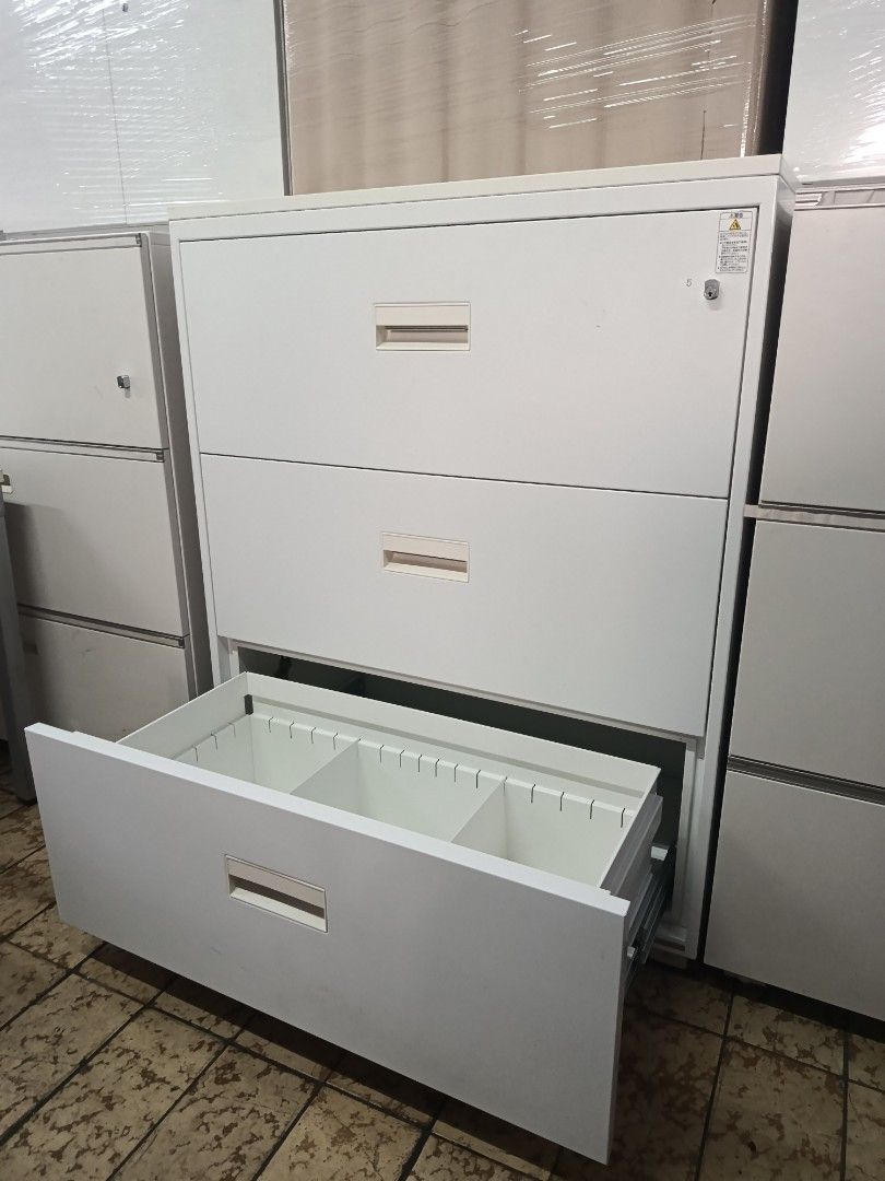 Nihon ISK Fire Resistant 3-Drawer Filing Cabinet White (Category: Office Furniture & Fixtures) located in Quezon City. Submitted by kevinmacabata12997160 (Listing ID 1465958278, Image 3). Description: - Brand/Model: Nihon ISK (Made in Japan, manufactured Jan-Jun 2019) - Material & Color: Heavy-duty white steel construction - Storage: 3 spacious drawers with smooth sliding rails - Security: Built-in locking mechanism for document safety - Fire Rat