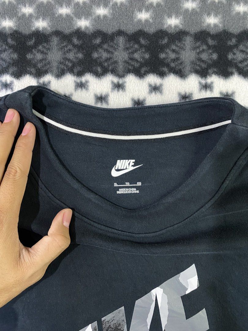 Nike (Category: Tshirts & Polo Shirts ) located in General Santos City (Dadiangas). Submitted by nokkie_thrift (Listing ID 1466137142, Image 3). Description: Nike camouflage logo Excellent condition Dimes 23x28 No issue.