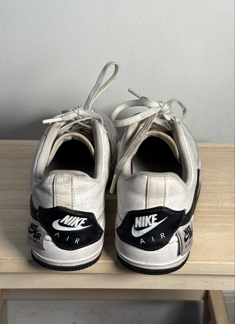 Nike Air Force 1 Jester XX White Black (Category: Sneakers) located in Pasig City. Submitted by meowstuff_ (Listing ID 1466072087, Image 3). Description: - Color: White with black swooshes and black rubber outsoles - Style: Chunky layered soles with signature heel tag and classic AF1 dubraes - Condition: Pre-loved with toe box creasing and midsole scuffs + signs of yellowing but can be cleaned - Perfect for daily casual wear - DM for inquiries an