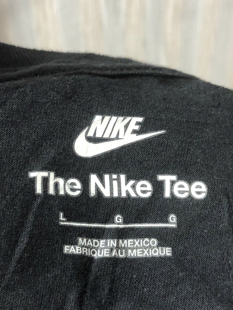 Nike Air The Nike Tee Black Size L (Category: Shirts) located in Montevista. Submitted by rdthriftshub (Listing ID 1466062352, Image 3). Description: - Nike Air t-shirt in solid black - Bold white graphic print on the front - Size: Medium to Large (L) with inner collar heat transfer tag - Material: 100% cotton for maximum comfort - Design: Classic crew neck and short sleeves - Origin: Made in Mexico - Condition: Excellent, ready to wear - Mode of