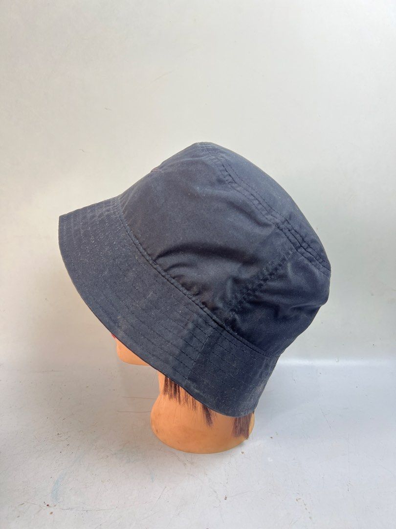 Nike Apex Bucket Hat Black Size M (Category: Caps & Hats) located in Baguio. Submitted by chiechie1234 (Listing ID 1466070440, Image 3). Description: - Brand: Nike Apex - Color: Black - Size: M - Material: 100% polyester - Design: Embroidered swoosh logo on the front - Condition: Clean interior lining with original brand tags attached - Features: Easy to fold and pack into a bag; versatile everyday streetwear staple.