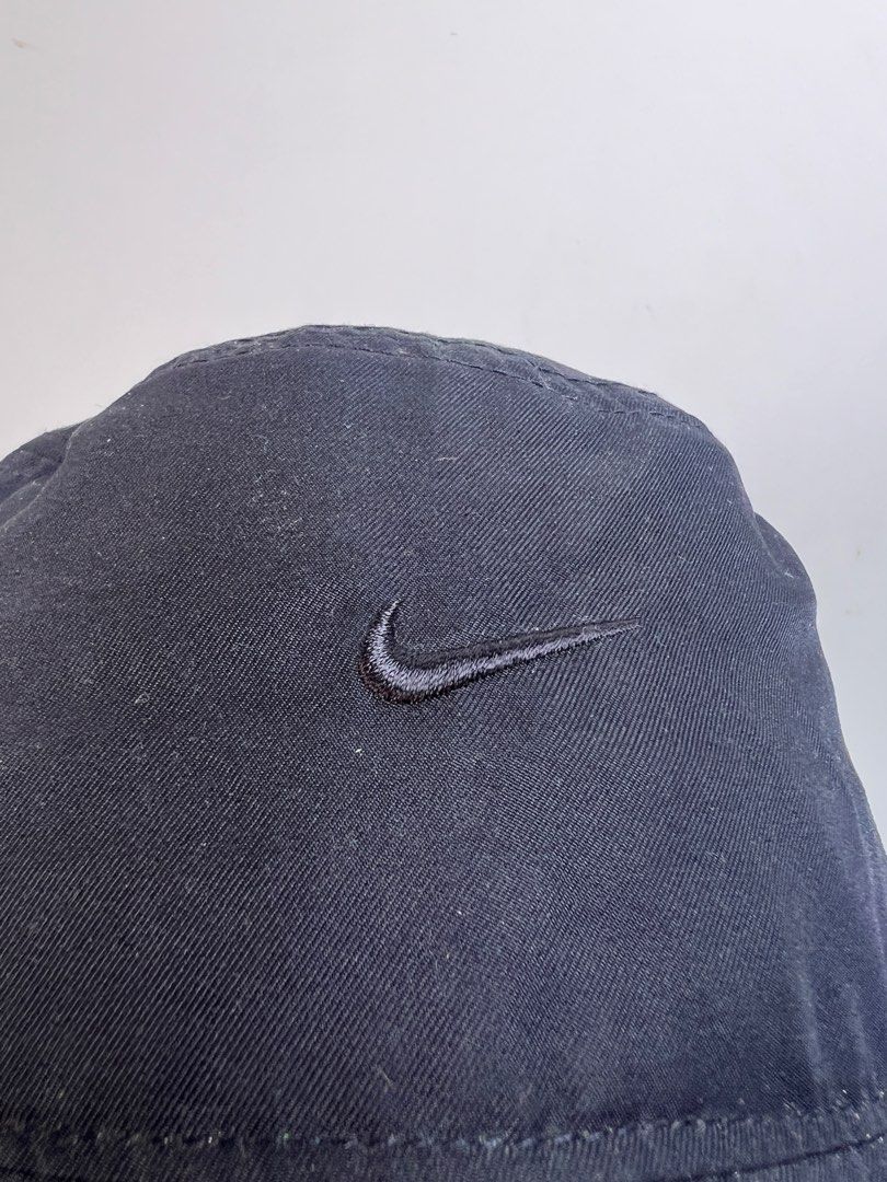 Nike Apex Bucket Hat Black Size M (Category: Caps & Hats) located in Baguio. Submitted by chiechie1234 (Listing ID 1466070440, Image 2). Description: - Brand: Nike Apex - Color: Black - Size: M - Material: 100% polyester - Design: Embroidered swoosh logo on the front - Condition: Clean interior lining with original brand tags attached - Features: Easy to fold and pack into a bag; versatile everyday streetwear staple.