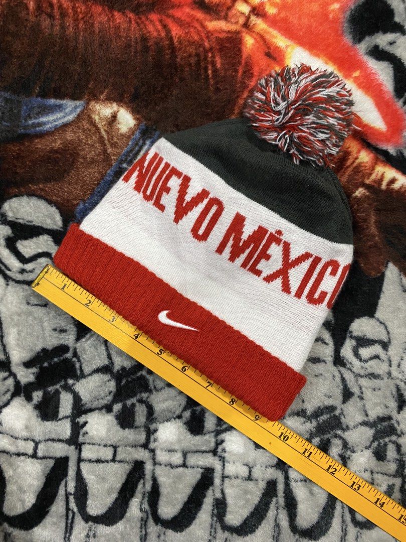 NIKE, Beanie hat (Category: Beanies) located in Cavite. Submitted by jc_thrift95 (Listing ID 1466112647, Image 2). Description: - Nike New Mexico Lobos red, white, and black knit pom beanie. - Color rate 8/10 - See pictures details for dimes..