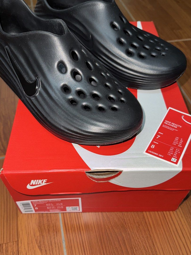 Nike Black Clogs - ReactX Rejuven8 (Category: Sneakers) located in Quezon City. Submitted by jellyaceeyoo (Listing ID 1465955772, Image 2). Description: - Same day delivery available!! - Brand: Nike - Model: ReactX Rejuven8 Slip-On Sandals - Color: Black - Size: US Men's 7 / US Women's 8; 25 cm - Condition: Brand new with tags, never worn - Inclusions: Original Nike box included - Features: Lightweight, breathable forefoot perforations, and ultra