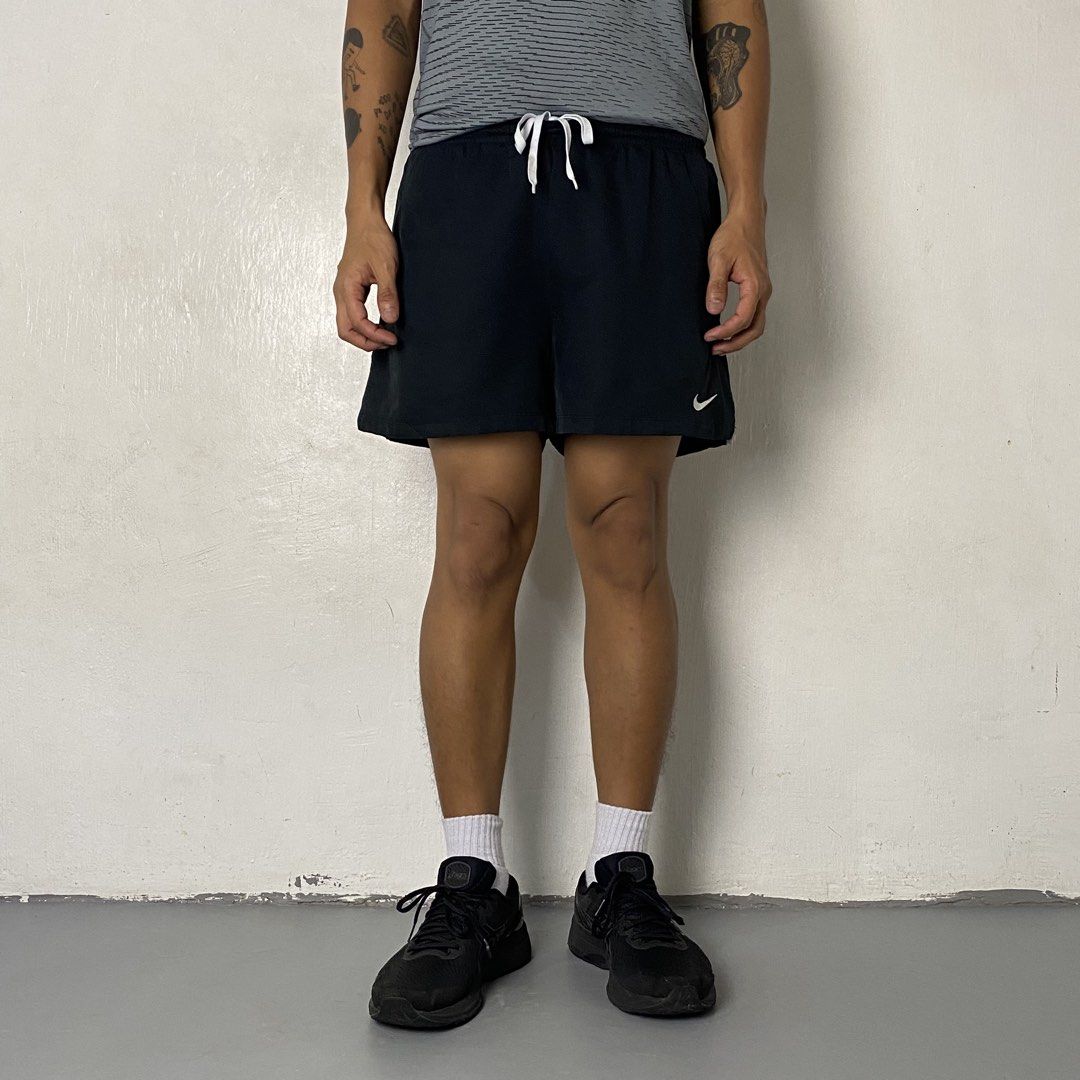 NIKE🏃‍♀️| Black Running Shorts (Category: Shorts) located in Bulacan. Submitted by orc.ph (Listing ID 1466077795, Image 2). Description: NIKE🏃‍♀️| Black Running Shorts Material Used: 100% Recycled Polyester - Black -Adjustable Drawstring - Elastic Waistband - No Pockets -Lightweight - Active Wear -Nike Side Swoosh -Side-Slit Curves -Size: XS-XL -Waistline: 28-35” -Length: 13.5” -Thighs: 13” -Leg Opening: 12.5” -Rise: 11” Model: ‘’5’0, 38kg, Wai