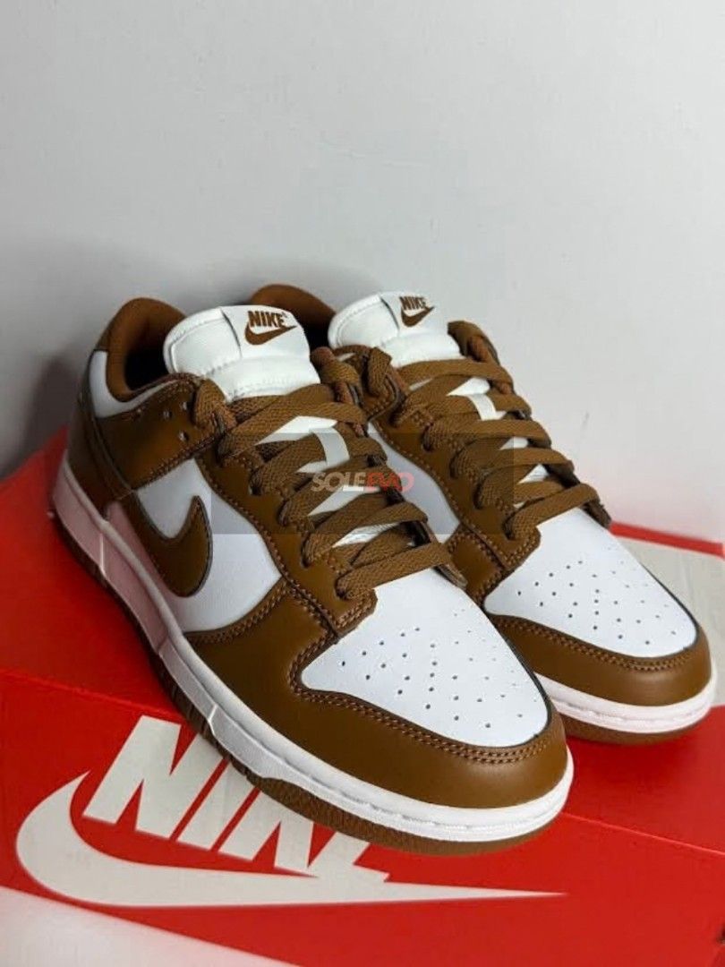 Nike Dunk Low "British Tan" (Category: Sneakers) located in Pasig City. Submitted by soleevo (Listing ID 1466058620, Image 2). Description: Dunk Low "British Tan" - Brandnew -Size: 6 US mens/ 7.5 womens - Php 2,850 - with box “Can send additional pictures.” Payment first policy. Location: Pasig City Facebook: Sole Evo Instagram: @sole.evo Disclaimer: We are not associated, affiliated with any brands that is posted. All intellectual property and t