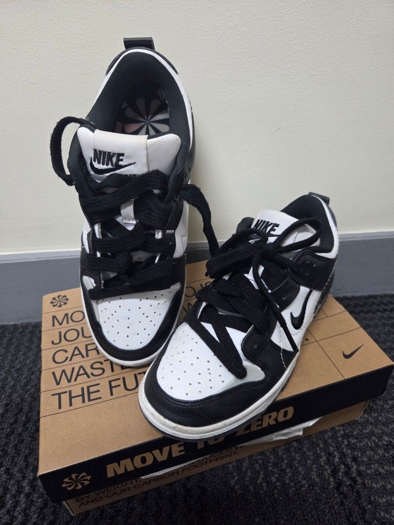 Nike Dunk Low Disrupt 2 Panda Black White Shoes (Category: Sneakers) located in Taguig. Submitted by cartaddictph (Listing ID 1466153528, Image 1). Description: -Size 7 Womens - Model: Nike Dunk Low Disrupt 2 (Panda Black/White) - Design: Chunky laces, deconstructed look, double swoosh embroidery - Condition: Worn a few times, minor dirt marks on soles and uppers from normal street wear - Inclusions: Original box included - Perfect for daily stre