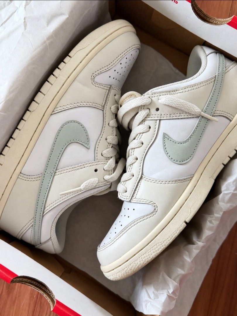 Nike Dunk Low GS (Category: Sneakers) located in Manila. Submitted by engelinerlln (Listing ID 1466003506, Image 1). Description: • Size: US - Women 7.5 / EU 38.5 • Color: White / Phantom / Light Silver • Original Nike box included • Bought from Nike app.