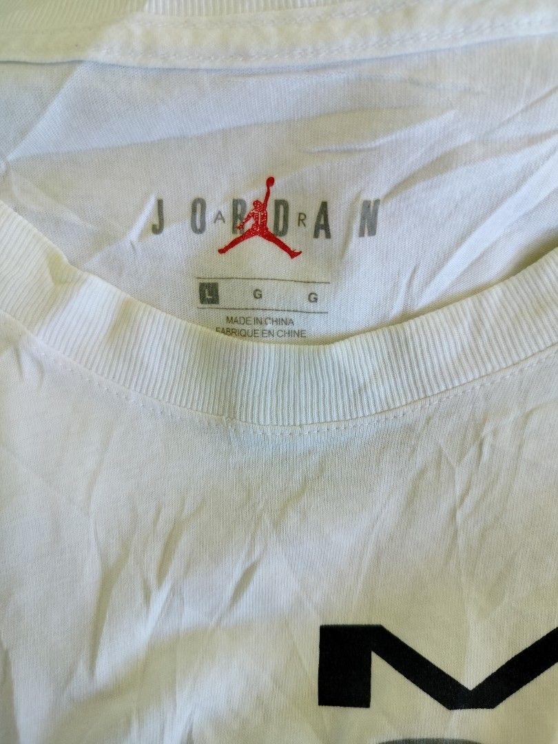 Nike Jordan Graphic Tee White Size L (Category: Tshirts & Polo Shirts ) located in Manila. Submitted by geraldquinto_917 (Listing ID 1465965120, Image 2). Description: - Brand: Nike Jordan - Size: Large - Color: White - Material: 100% Cotton - Design: Multicolor collage graphic with MJ and basketball imagery on front and lower side - Details: Short sleeves, classic crew neck, style code CJ6224-100 - Condition: Brand new / Excellent quality - Ship