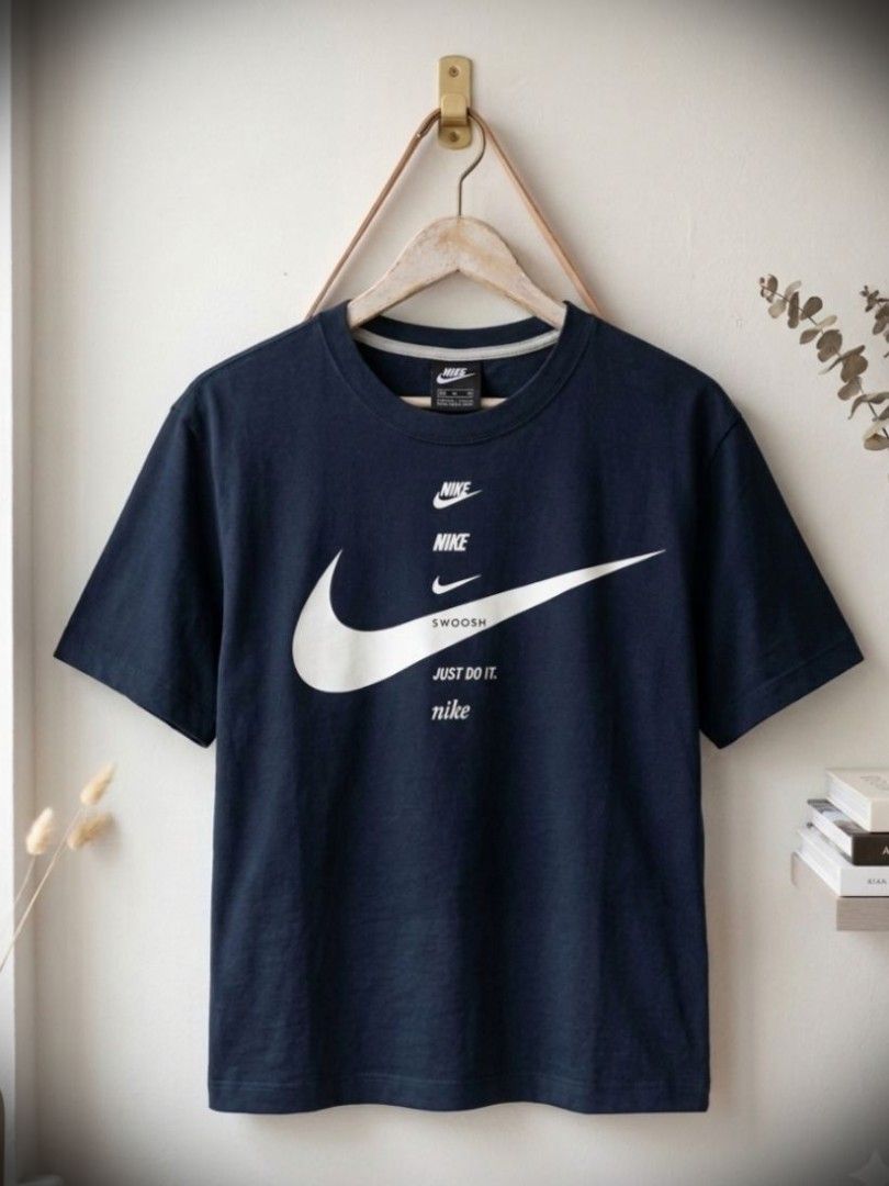Nike Mid Multi Swoosh Boxy Shirt (rare) (Category: Tshirts & Polo Shirts ) located in Manila. Submitted by liliaplay (Listing ID 1463134510, Image 1). Description: Authentic!! Pre-loved Imported crewneck semi lightweight Big swoosh Solid Prints Unisex fit to 5'8 and 75 kg for boys size: 24 x 26 (Navy Blue) No Issue! Complete Tags Lowered to its negotiable price! Payment 1st Shipped.