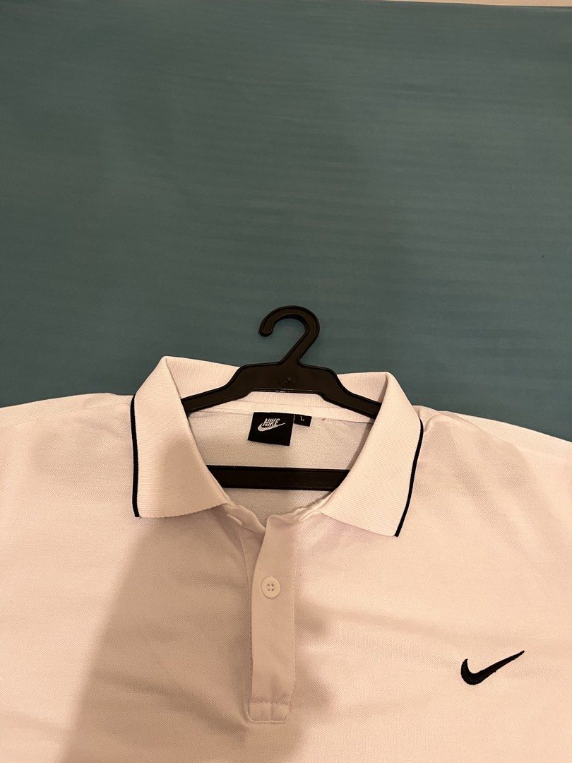 Nike polo white L (Category: Tshirts & Polo Shirts ) located in Surigao. Submitted by tandag_thrift_archive (Listing ID 1466085103, Image 2). Description: Nike Polo White with Black Piping - Size L Good condition, no yellow stains Black lining sa collar at sleeves Embroidered swoosh Perfect pang office, school, porma 📍 Tandag - ship via J&T Bundle: ₱600 for 2 with my brown polo!.