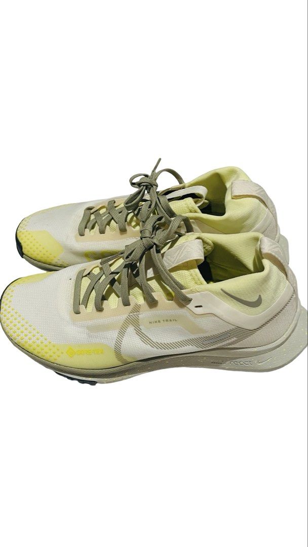 Nike React Pegasus Trail 4 Gore-Tex Yellow Trail Shoes (Category: Sneakers) located in Quezon City. Submitted by i2ochelle227661 (Listing ID 1465989087, Image 2). Description: - Original and bought from USA - Model: Nike React Pegasus Trail 4 Gore-Tex - Colorway: Yellow and white with olive green laces - Waterproof GORE-TEX membrane to keep your feet dry in wet conditions - Cushioned midsole for superior comfort on long-distance runs - Durable ru