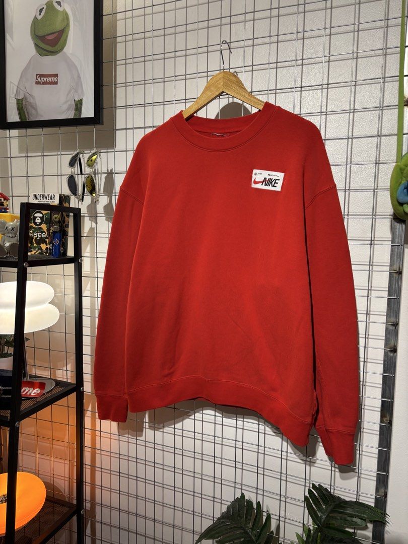 Nike Red Leap High 2023 Sweatshirt (Category: Coats, Jackets and Outerwear) located in Cavite. Submitted by vlblgrmnts_ (Listing ID 1466078278, Image 2). Description: Nike - P230 25x27 Large bestfit 9/10 CR 800 - Brand: Nike - Color: Vibrant Red - Material: Heavyweight cotton blend for cooler weather - Design: Woven logo patch with 'LEAP HIGH 2023' text on chest - Details: Embroidered 'JUST DO IT.' text and graphic on sleeve cuff - Fit: Classic c