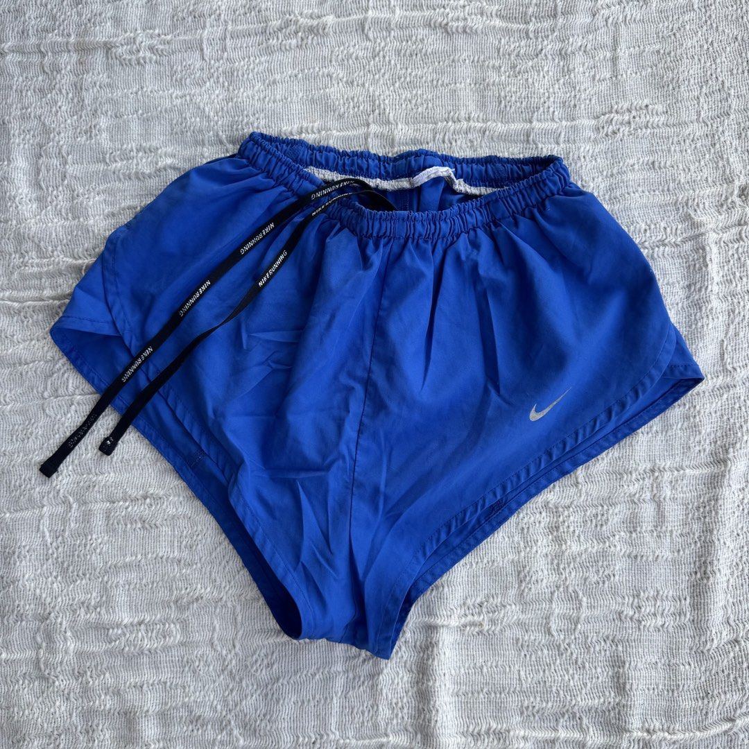 Nike Royal Blue Short Shorts (Category: Activewear) located in Manila. Submitted by thriftclub.ph (Listing ID 1466104937, Image 1). Description: ▫️Decluttering (too many sportswear!) ◻️ Fits xs - s ⬜️ Short shorts - needs inner cycling ⚪️ Drawstring (Adjustable).
