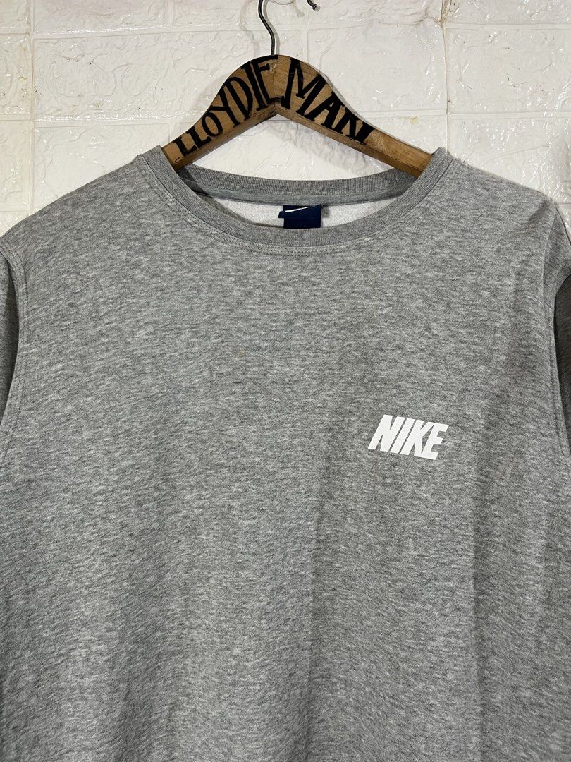 nike spell out logo gray sweater (Category: Coats, Jackets and Outerwear) located in Manila. Submitted by lloydiemmfmannn (Listing ID 1466060456, Image 2). Description: nike spell out logo gray sweater sz XXL on tag fits XL w24 l28.5 flaws: yellowish ribbings need wash pasay location.