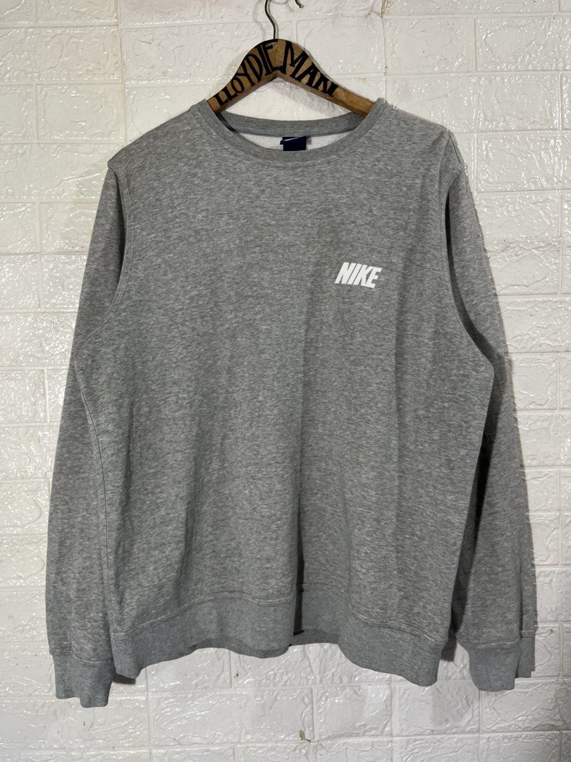 nike spell out logo gray sweater (Category: Coats, Jackets and Outerwear) located in Manila. Submitted by lloydiemmfmannn (Listing ID 1466060456, Image 1). Description: nike spell out logo gray sweater sz XXL on tag fits XL w24 l28.5 flaws: yellowish ribbings need wash pasay location.