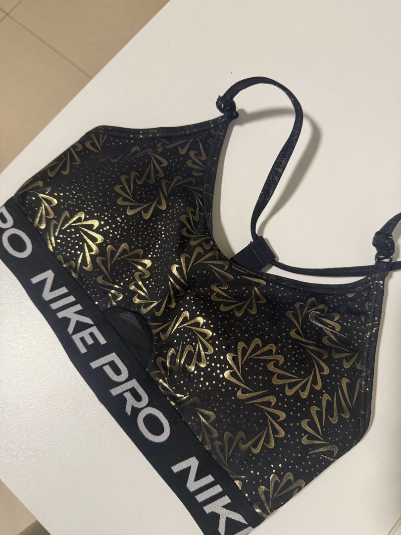 Nike Training Pro sports bra (Category: Activewear) located in Pasig City. Submitted by roadtominimalism09 (Listing ID 1466154732, Image 2). Description: Nike Training Pro sports bra GRX Dri-FIT Indy strappy Size medium, 85cm Rfs:no flaws, i got fat, this feels too tight for me for a medium size.