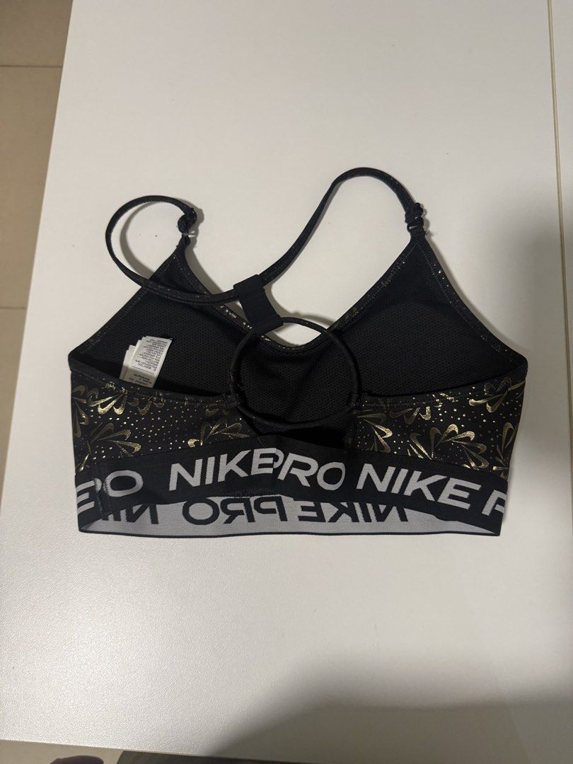 Nike Training Pro sports bra (Category: Activewear) located in Pasig City. Submitted by roadtominimalism09 (Listing ID 1466154732, Image 3). Description: Nike Training Pro sports bra GRX Dri-FIT Indy strappy Size medium, 85cm Rfs:no flaws, i got fat, this feels too tight for me for a medium size.