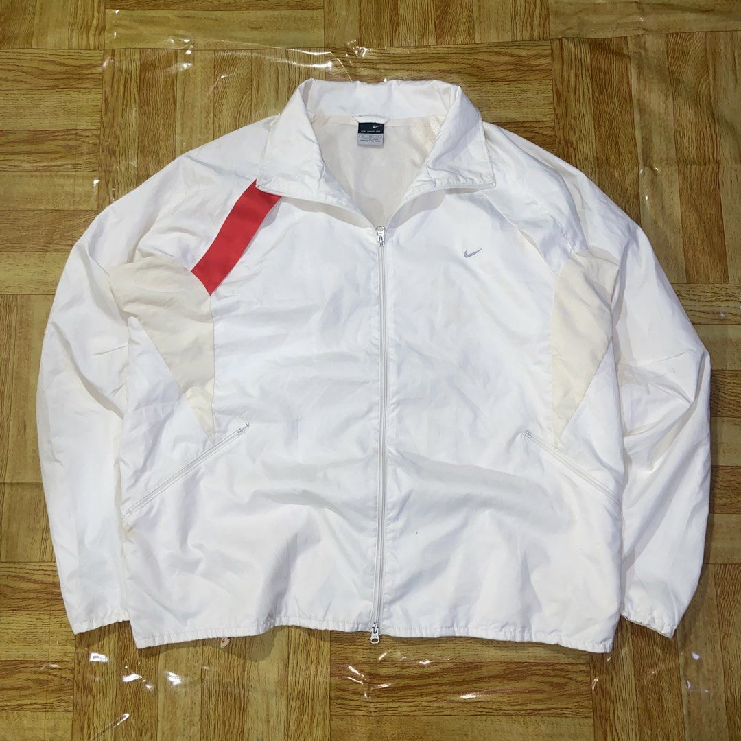 Nike Windbreaker Jacket (Category: Activewear) located in Dasmarinas. Submitted by thrift2gems (Listing ID 1466124396, Image 1). Description: Nike Windbreaker Jacket -WIDTH: 22.5 -LENGTH: 25.5 -COLOR RATE: 9/10 -CONDITION: 9/10 -ISSUE: NEED WASH , STAINS.