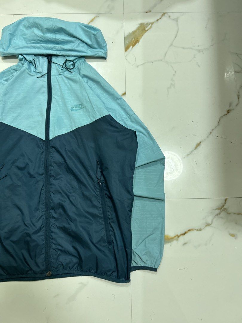Nike Windrunner Jacket (Category: Coats, Jackets and Outerwear) located in Cebu City. Submitted by judetalandron7 (Listing ID 1466066228, Image 2). Description: Size M-L Need deep wash.