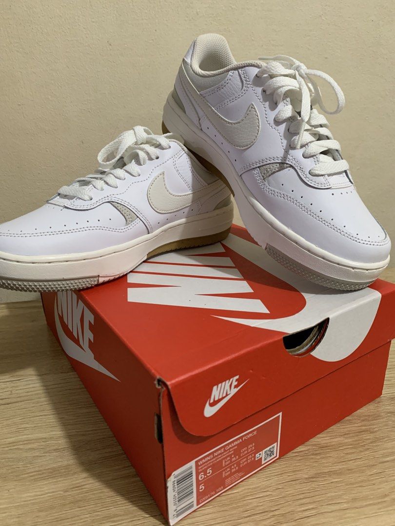 Nike Women's Gamma Force White Phantom Light Bone (Category: Sneakers) located in Manila. Submitted by coolstuffonlyyy (Listing ID 1466010189, Image 2). Description: - Brand: Nike Gamma Force - Colorway: White and Phantom Light Bone - Size: Women's US 6.5 / EUR 37.5 - Details: Clean leather upper, chunky rubber midsole, and stylish gum sole - Inclusion: Comes with original Nike shoebox - Condition: Well-kept and ready to ship!.