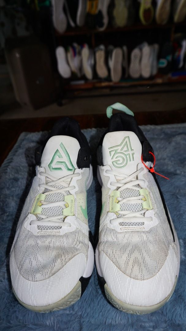 Nike-Giannis Immortality 2 'White Black Volt' DM0825-101 (Category: Sneakers) located in Lucena. Submitted by erikj27 (Listing ID 1466046656, Image 2). Description: No box from Thrift Store (ukay-ukay) - Model: Nike-Giannis Immortality 2 'White Black Volt' DM0825-101 - Colorway: White Black Volt' - Size: UK 9.5 / EUR 42.5 - Design: Iconic large reverse swoosh on the lateral side - Performance: Zoom Air cushioning with a multidirectional traction 