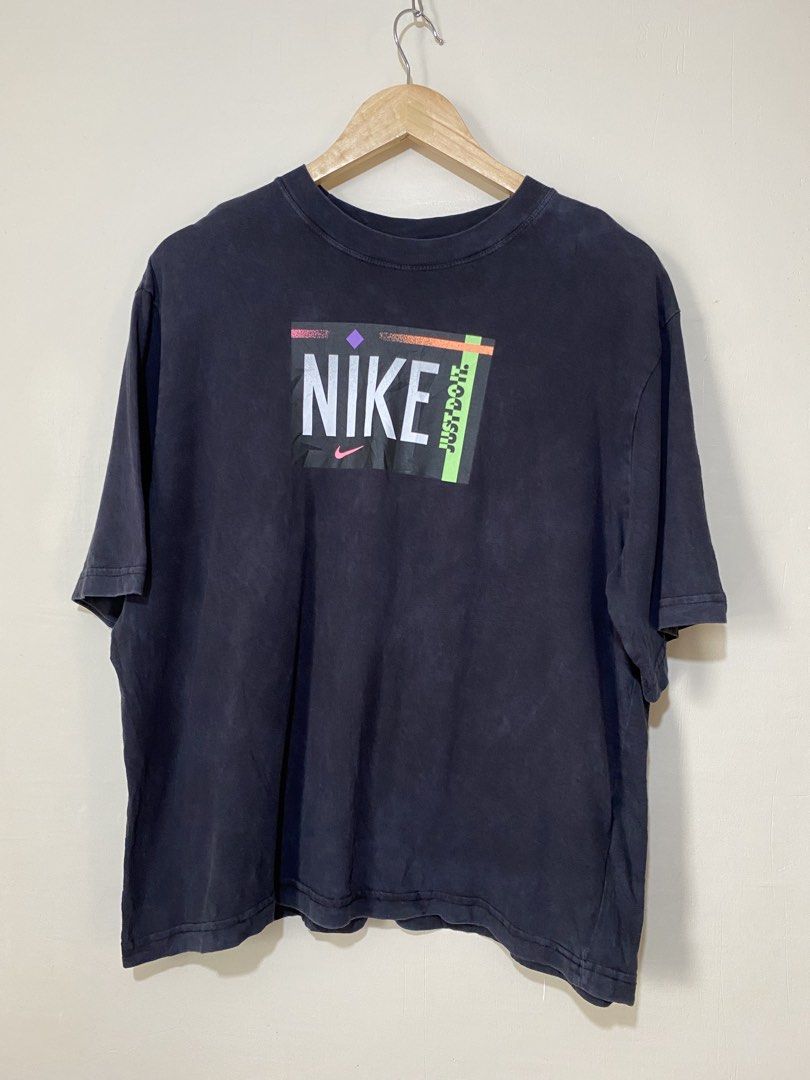 NIKE,washed short-sleeve T-shirt (Category: Shirts) located in Cavite. Submitted by jc_thrift95 (Listing ID 1466091602, Image 1). Description: - This is a Nike women’s washed short-sleeve T-shirt featuring a retro box logo with neon and geometric graphics. - Made in Turkey - L- 26 inch - W- 24 inch - (Unisex pwede) - Color rate 8/10 - See pictures details for dimes..