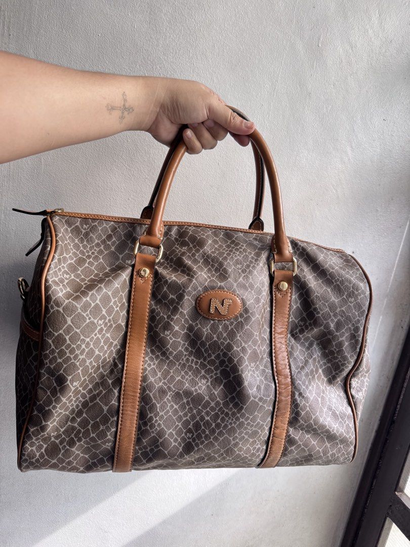 Nina Ricci Boston 38cm (Category: Luxury Bags & Wallets) located in Manila. Submitted by thriftyhaven2023 (Listing ID 1466038495, Image 3). Description: No sling.