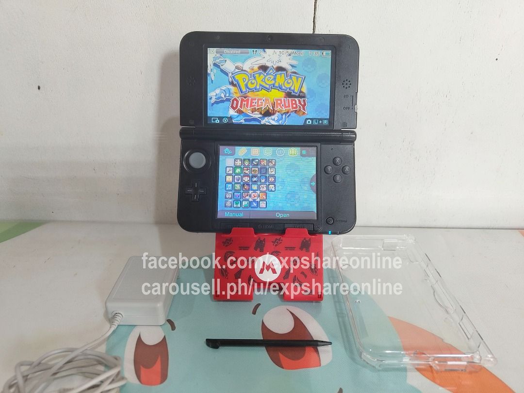 Nintendo 3DSXL 16GB With Games (Category: Nintendo) located in Cebu City. Submitted by expshareonline (Listing ID 1465964056, Image 1). Description: - Nintendo 3DS XL handheld console in blue - 16GB storage capacity with popular pre-installed games (Pokémon, Animal Crossing, Mario Kart, Zelda) - Dual screens in working condition - Includes original charger, stylus, and protective clear case - Ready to use for gaming enthusiasts.