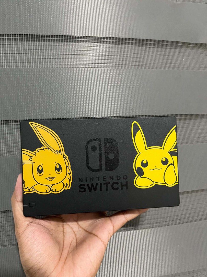 Nintendo switch dock (Category: Nintendo) located in Quezon City. Submitted by all_about_retro (Listing ID 1466113183, Image 1). Description: Nintendo switch dock Pokemon let’s go Tested ok Meron ako video dito na working siya Missing back cover pero hindi nmn nakaka apekto sa performance takip lang nmn wala Pickup.