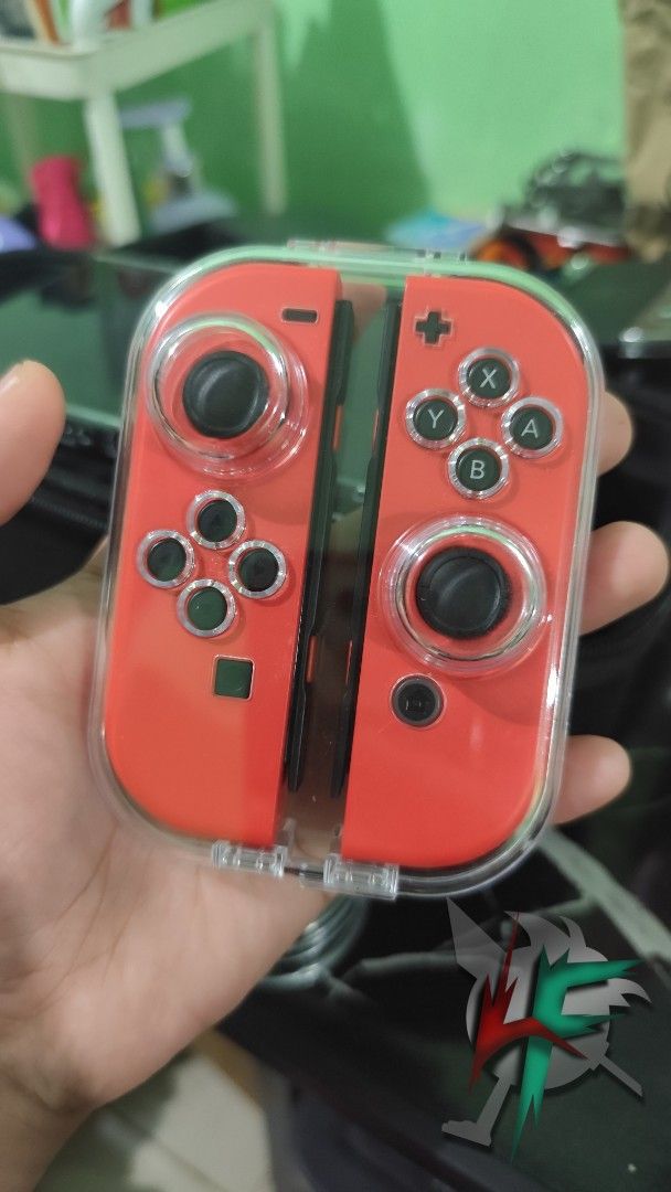 Nintendo Switch JOYCON "Mario Red Edition" (Authentic) (Category: Nintendo) located in Taguig. Submitted by love.figures.toy.shop (Listing ID 1466037635, Image 2). Description: Nintendo Switch Joycon Super Mario Red Limited Edition Authentic Nintendo Product No Issue, Good Condition With Free Travel Case.