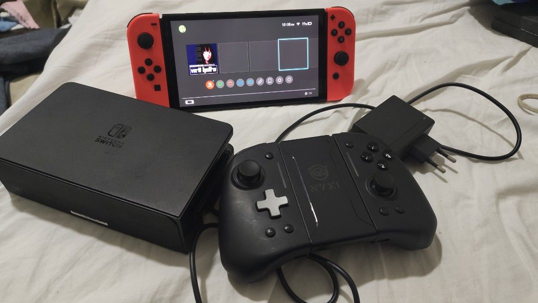 Nintendo Switch OLED Modded + Extra Controller (Category: Nintendo) located in Kuala Lumpur. Submitted by nikzaen (Listing ID 1466138776, Image 1). Description: selling my used Switch OLED 128gb including extra controller, I can help you install some games you want depending on request COD TTDI PJ.