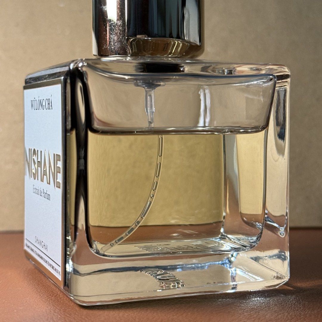 Nishane Wulong Cha Extrait de Parfum - Authentic Niche Perfume (Category: Fragrance & Deodorants) located in Makati City. Submitted by junkhmail (Listing ID 1466097785, Image 3). Description: - lightly used niche fragrance (see last picture) - no box, can send more pics to interested buyers - 100ml extrait de parfum - notes of bergamot, orange, oolong tea, musk, and fig rfs: not used as much mop: gcash/bank transfer mod: lalamove or grab 📍metro 