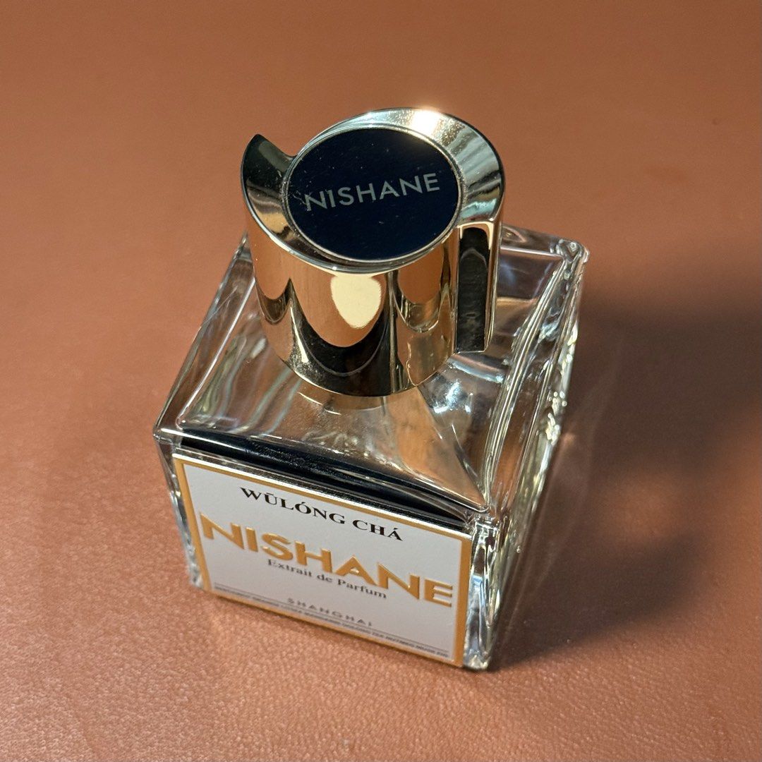Nishane Wulong Cha Extrait de Parfum - Authentic Niche Perfume (Category: Fragrance & Deodorants) located in Makati City. Submitted by junkhmail (Listing ID 1466097785, Image 2). Description: - lightly used niche fragrance (see last picture) - no box, can send more pics to interested buyers - 100ml extrait de parfum - notes of bergamot, orange, oolong tea, musk, and fig rfs: not used as much mop: gcash/bank transfer mod: lalamove or grab 📍metro 