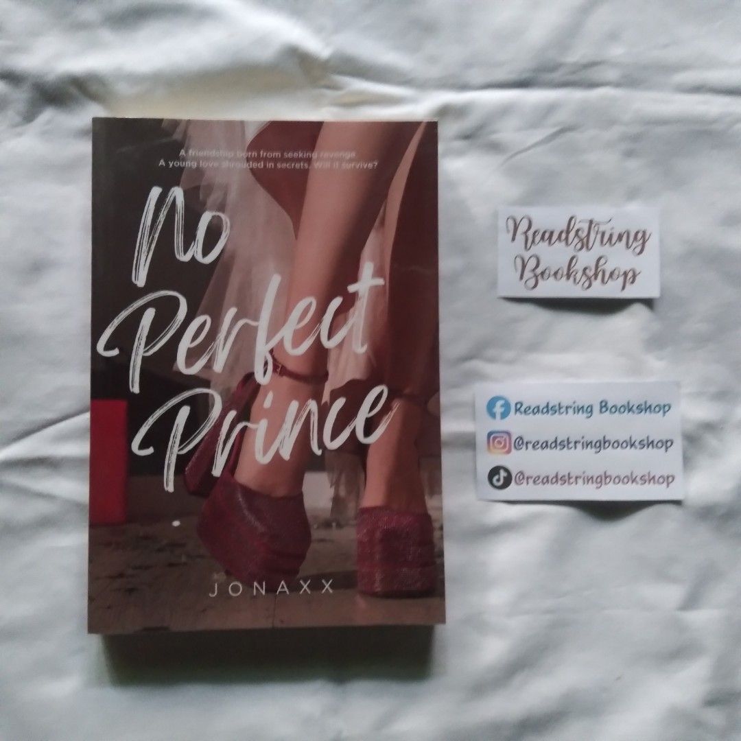 No Perfect Prince by Jonaxx (Category: Storybooks) located in Madridejos. Submitted by readstringbookshop (Listing ID 1466105851, Image 1). Description: NO PERFECT PRINCE •signed •with bookmark •with plastic cover 🏷️ ₱230 🍓 Please check the book's condition carefully before commenting "mine," as some books may have dents, dirt, stains, tanning, or foxing. 🍓 The photos may not fully reflect the book's overall condition due to lighting and camer