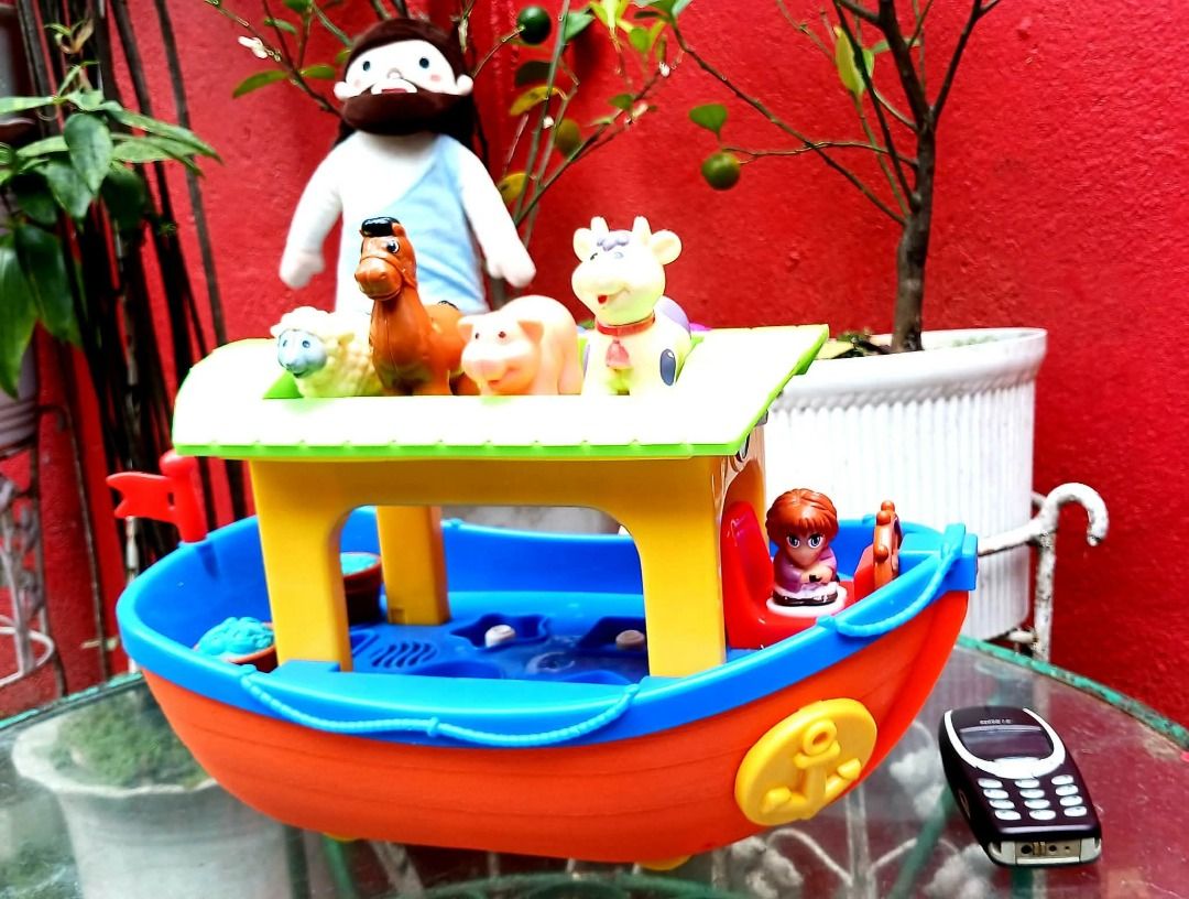 NOAH'S ARK w/ Animal Figures & Xylophone (Working) (Category: Vintage Collectibles) located in Manila. Submitted by mickey_salonga (Listing ID 1466046155, Image 1). Description: - Vibrant toddler toy boat in bright orange, blue, and yellow with a green roof - Features a built-in xylophone with colorful keys on the roof for musical play - Includes animal figurines (sheep, horse, pig, cow) - Equipped with rolling wheels for fun push-along play - Gr