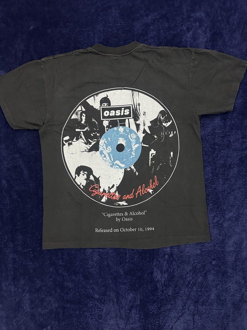 Oasis “Cigarettes & Alcohol" vintage T-Shirt (Category: Tshirts & Polo Shirts ) located in Quezon City. Submitted by rackculture (Listing ID 1465967775, Image 2). Description: 👕 Size Large 21.5 width 27 length 🧵Single Stitch All the Way 🏷️ Giant onTag ₱ 1,500 only 📩 Message us to order.