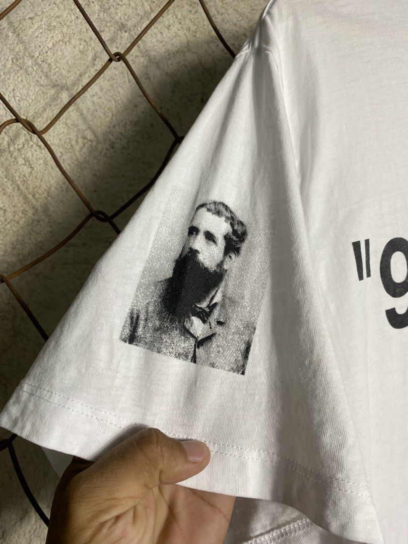 Off-White Impressionism 1999 White T-Shirt (Category: Shirts) located in Cabanatuan. Submitted by adrialesdrip (Listing ID 1466074551, Image 2). Description: - Brand: Off-White (Impressionism Collection) - Material: Clean white premium cotton - Design: Claude Monet artwork graphic print on the back - Front: Signature quotes and numbers on the chest - Sleeves: Black and white portrait, pink script text, and 1863 date - Authenticity Detail: Classic