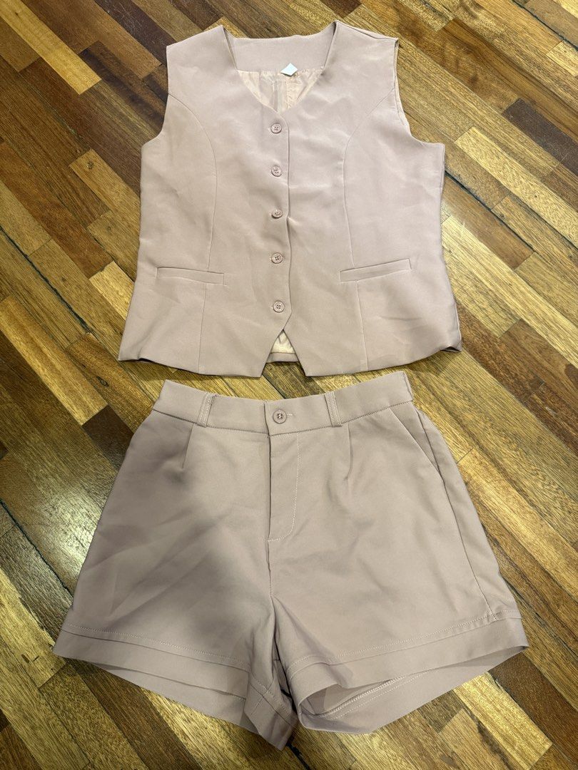 Old Rose Vest and Shorts Set (Category: Sets or Coordinates) located in Iloilo. Submitted by dabyladaby2 (Listing ID 1465974710, Image 1). Description: Once Used/ Still New/ Lining on the Vest Large on Tags Shoulder-38cm Chest -48cm Length- 54cm Waist - garterized 35-42cm Hips- 48cm Length- 36cm .